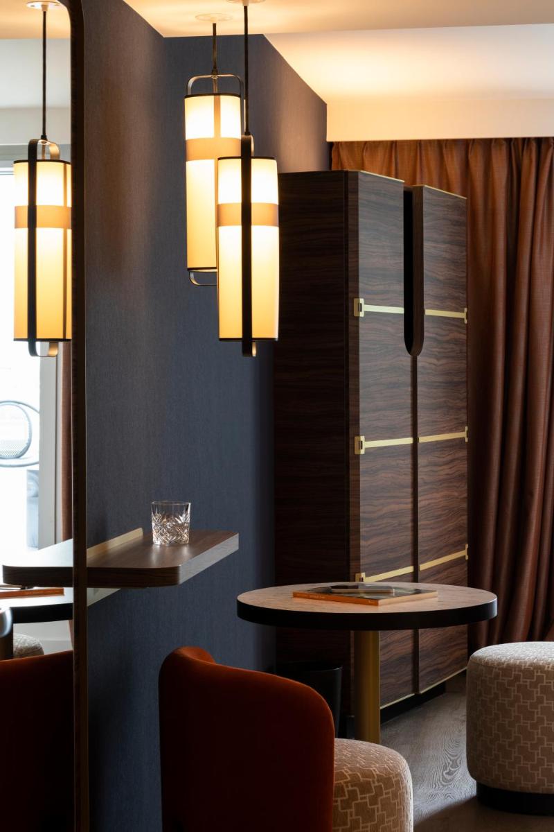 Coin salon dans l'établissement Hôtel & Spa Oceania Le Conti