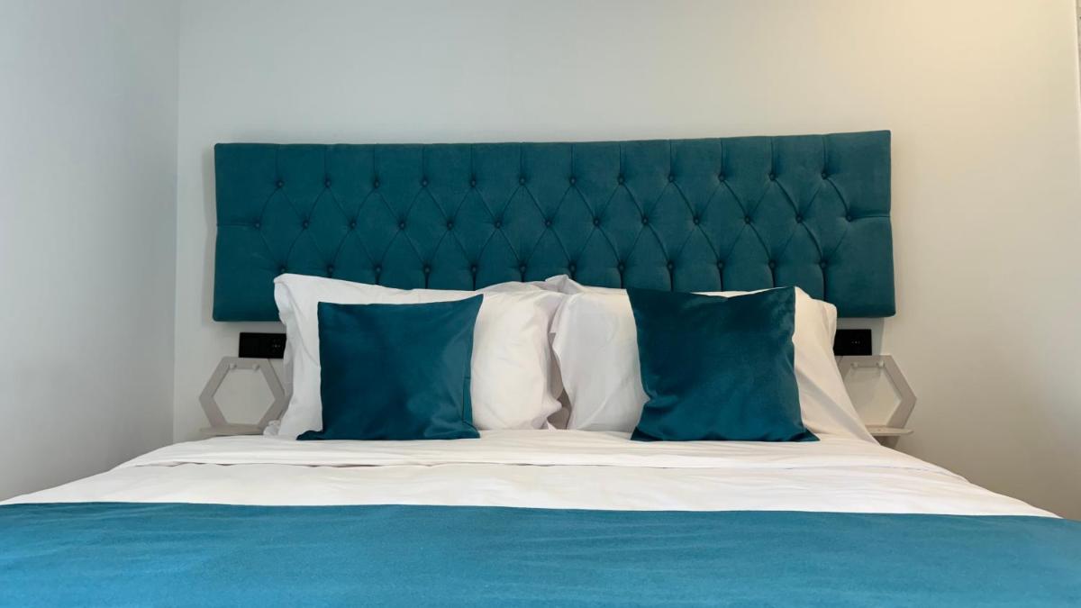 Cama o camas de una habitación en Apart-hotel Happy Life
