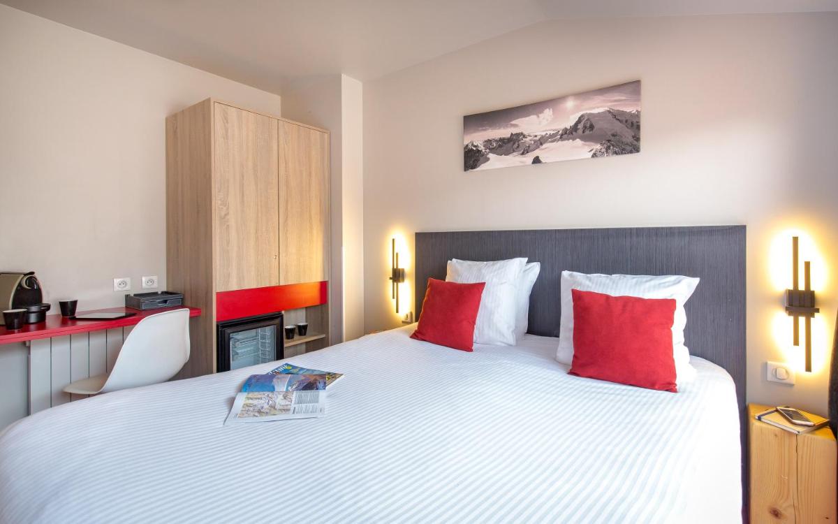 Un ou plusieurs lits dans un hébergement de l'établissement SOWELL HOTELS Le Parc & Spa