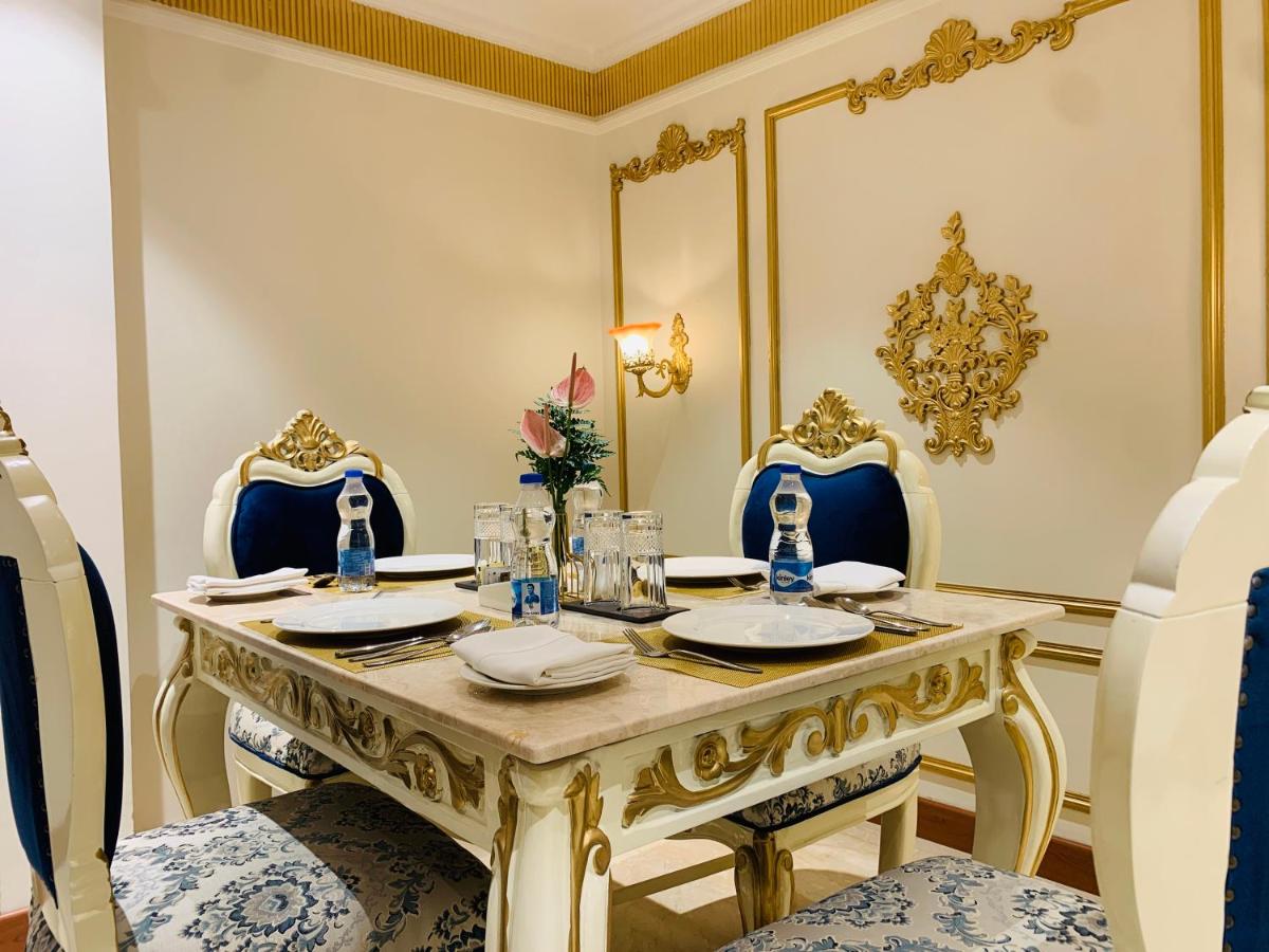 a dining room with a table and chairs at The Accord Metropolitan in Chennai