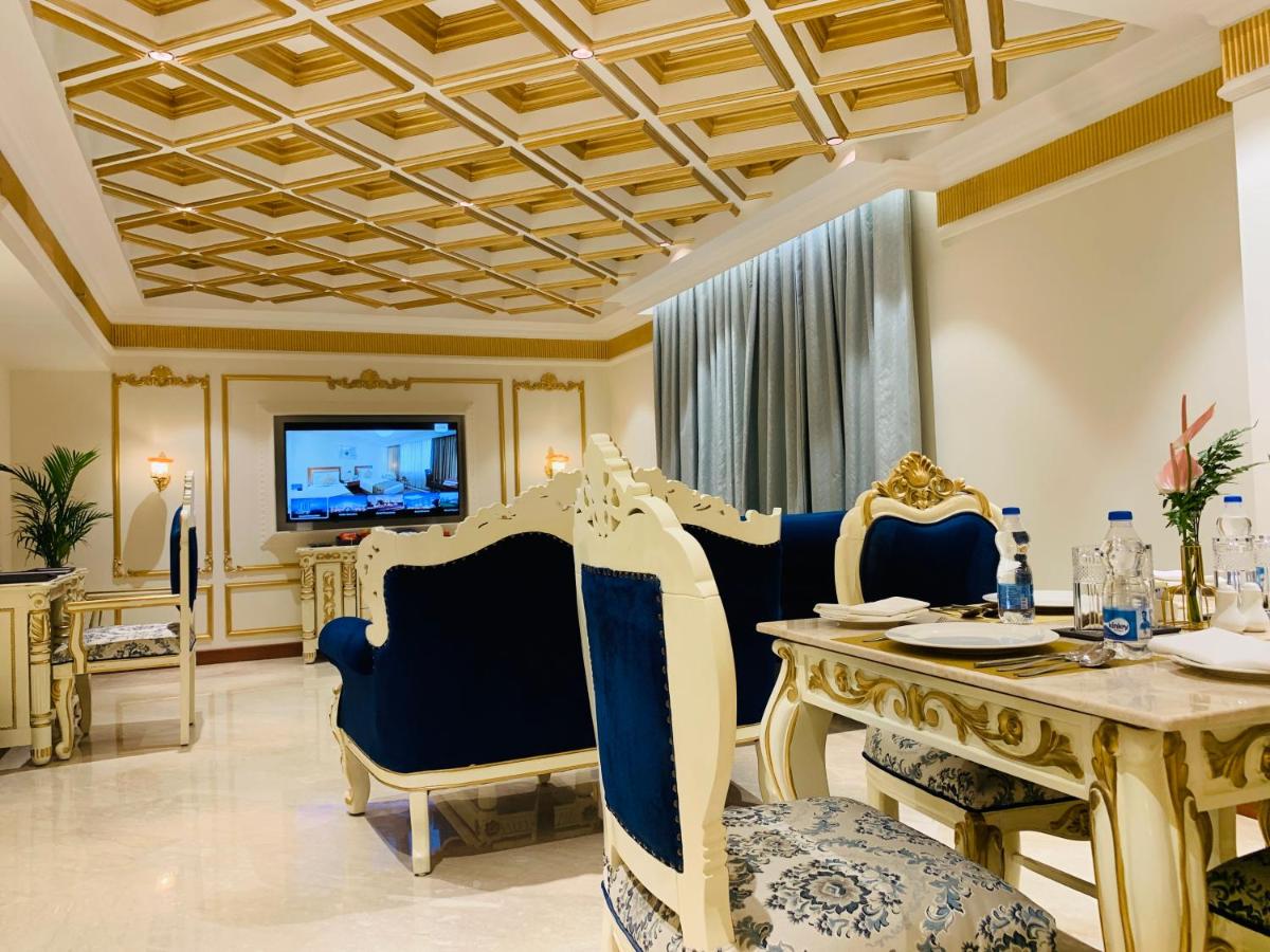 a dining room with a table and chairs at The Accord Metropolitan in Chennai