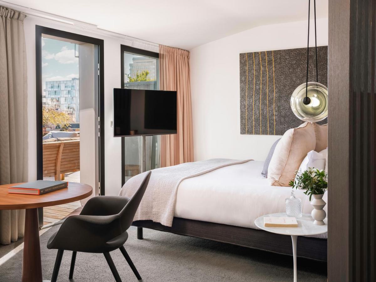 Télévision ou salle de divertissement dans l'établissement Balthazar Hotel & Spa Rennes - MGallery Collection
