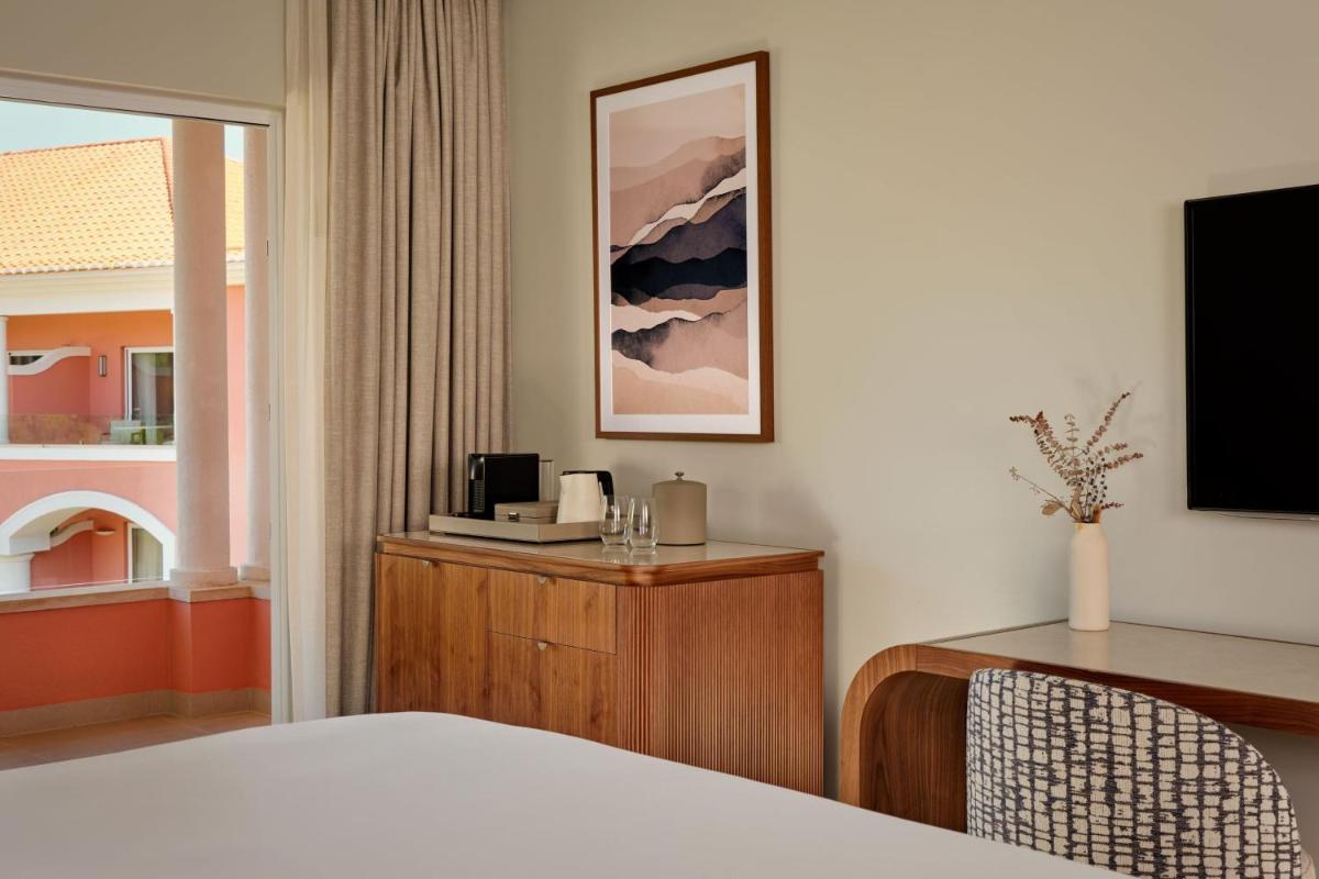 Uma cama ou camas num quarto em Penha Longa Resort