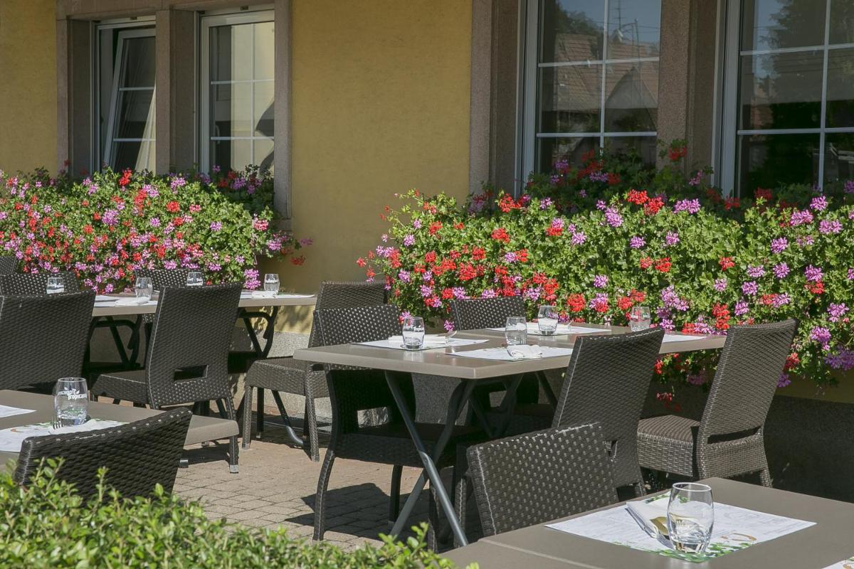 Restaurant ou autre lieu de restauration dans l'établissement Best Western Plus Au cheval Blanc à Mulhouse