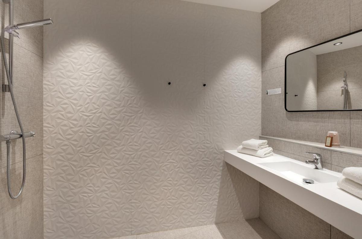 Salle de bains dans l'établissement Hôtel De L'octroi