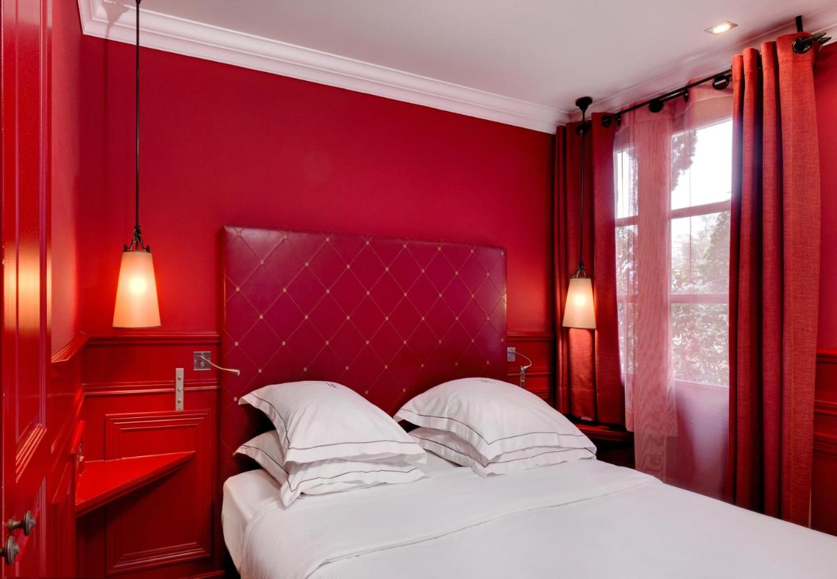 Un ou plusieurs lits dans un hébergement de l'établissement Hôtel du Château & Spa - Teritoria