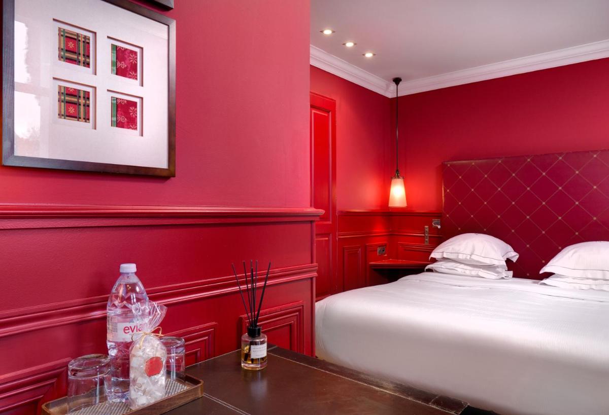 Un ou plusieurs lits dans un hébergement de l'établissement Hôtel du Château & Spa - Teritoria