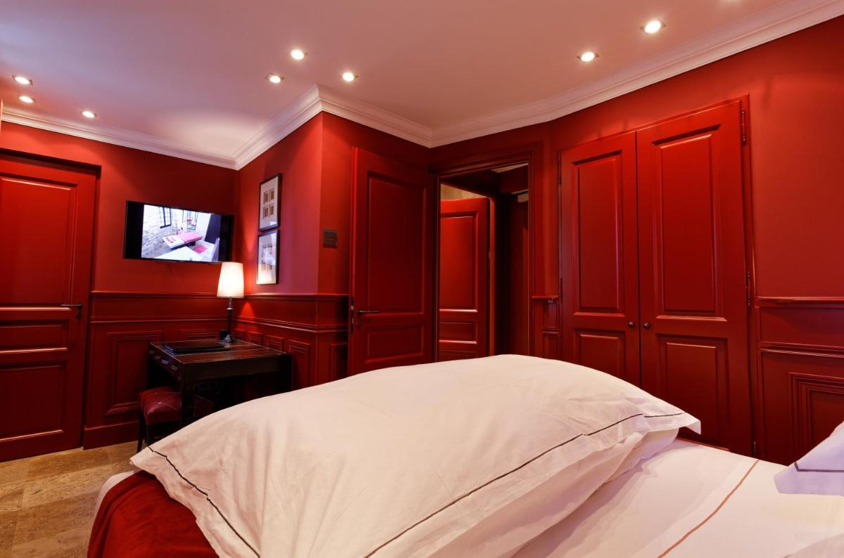 Un ou plusieurs lits dans un hébergement de l'établissement Hôtel du Château & Spa - Teritoria