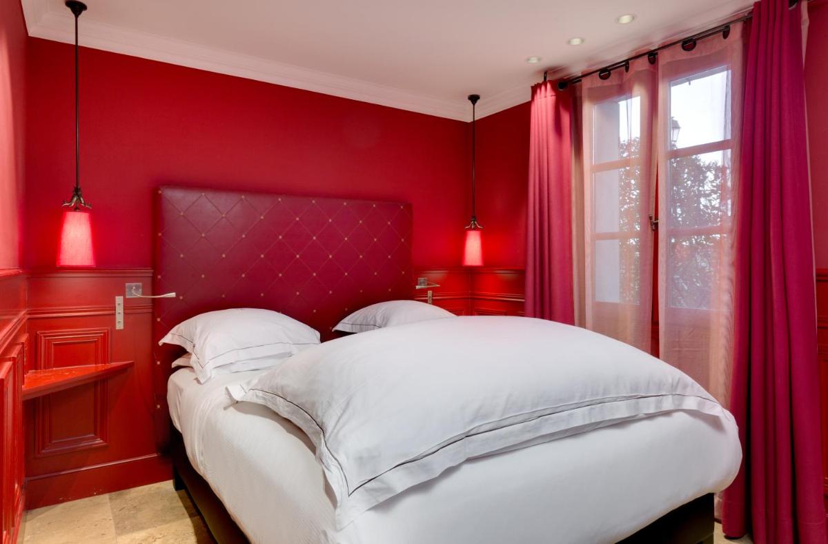 Un ou plusieurs lits dans un hébergement de l'établissement Hôtel du Château & Spa - Teritoria