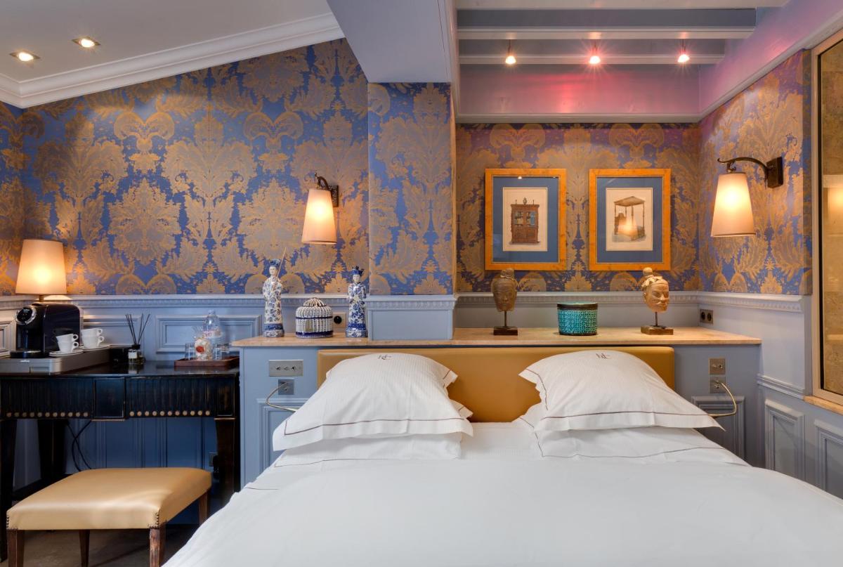Un ou plusieurs lits dans un hébergement de l'établissement Hôtel du Château & Spa - Teritoria