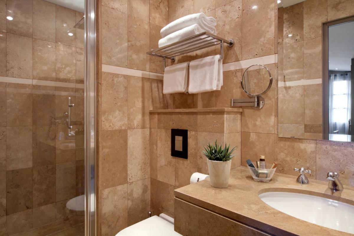 Salle de bains dans l'établissement Hôtel du Château & Spa - Teritoria