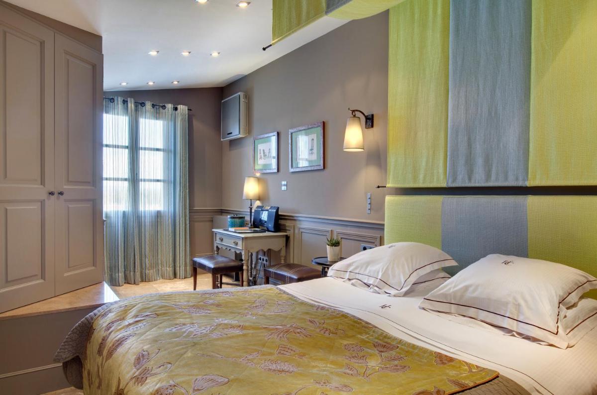 Un ou plusieurs lits dans un hébergement de l'établissement Hôtel du Château & Spa - Teritoria