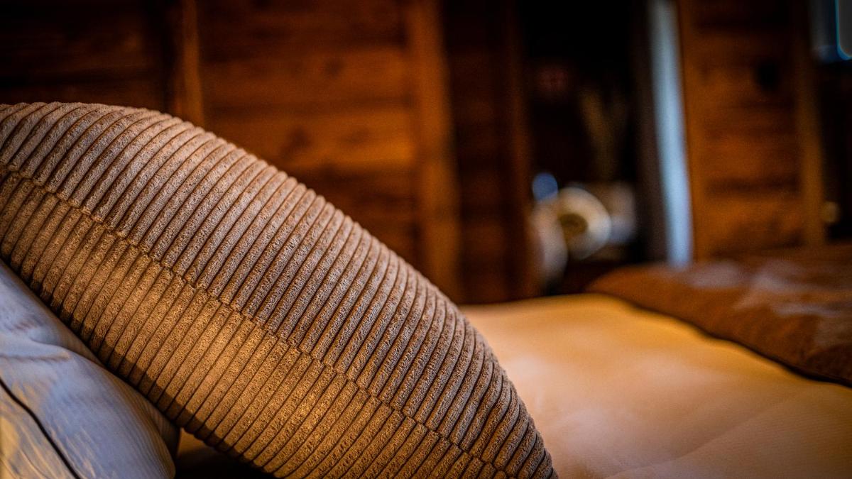 Un ou plusieurs lits dans un hébergement de l'établissement LA CABANE DU BREUIL