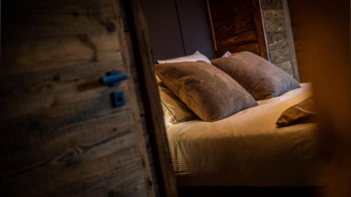 Un ou plusieurs lits dans un hébergement de l'établissement LA CABANE DU BREUIL