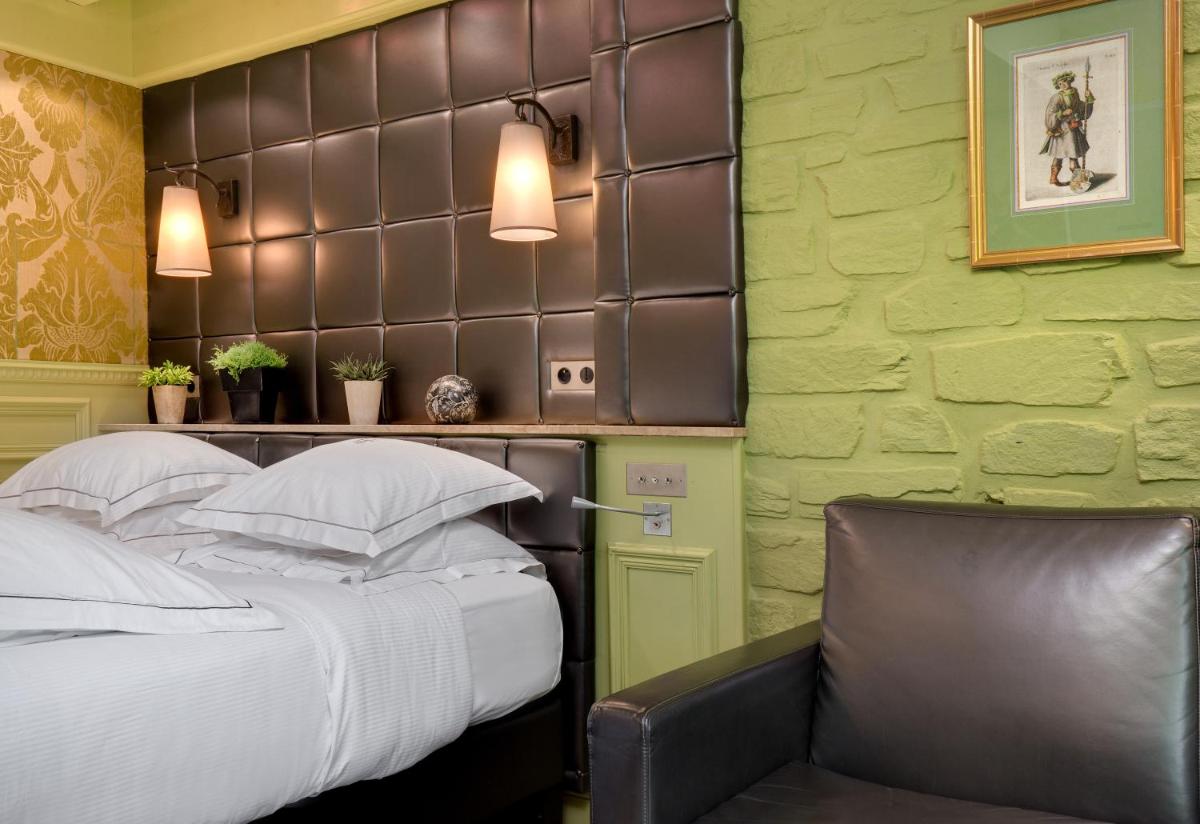 Un ou plusieurs lits dans un hébergement de l'établissement Hôtel du Château & Spa - Teritoria
