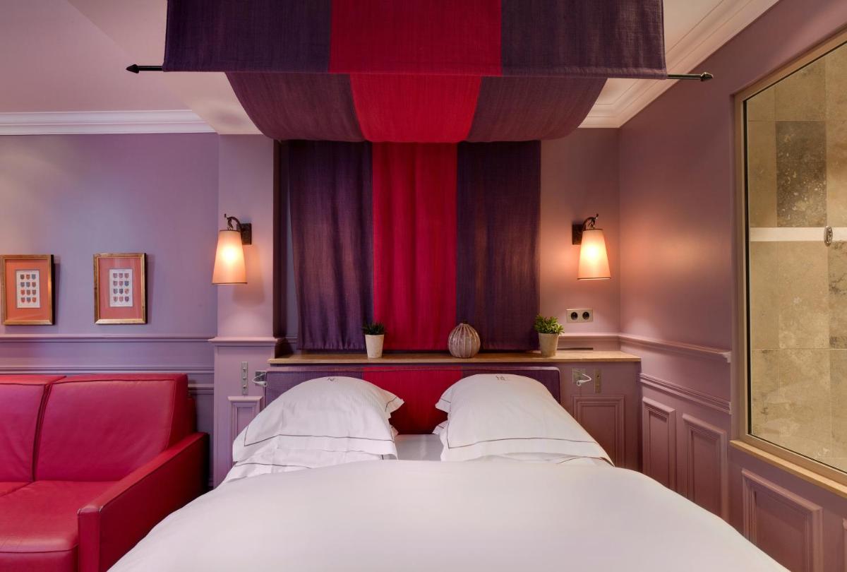 Un ou plusieurs lits dans un hébergement de l'établissement Hôtel du Château & Spa - Teritoria