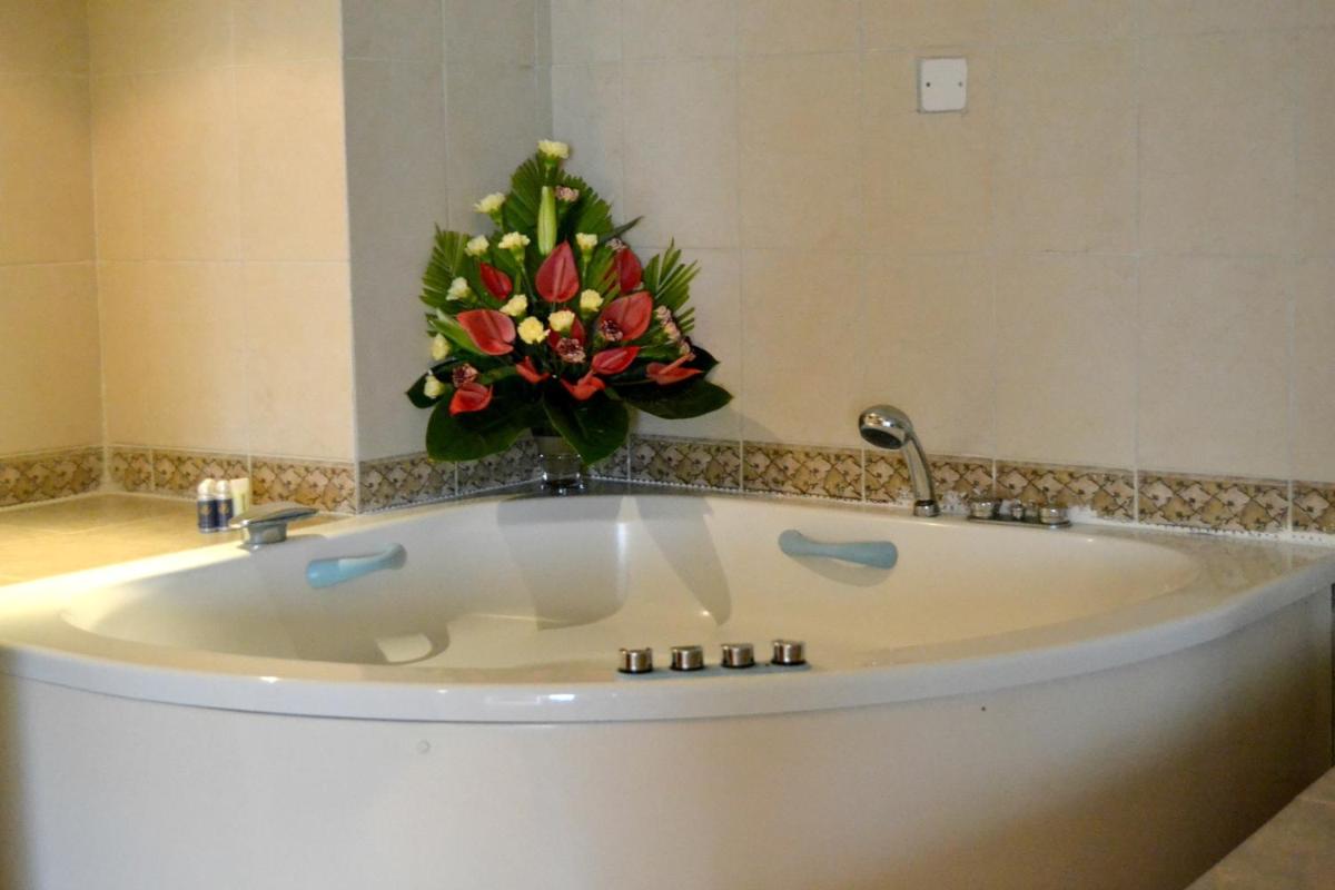 Golden Tulip Dar es Salaam - Housity