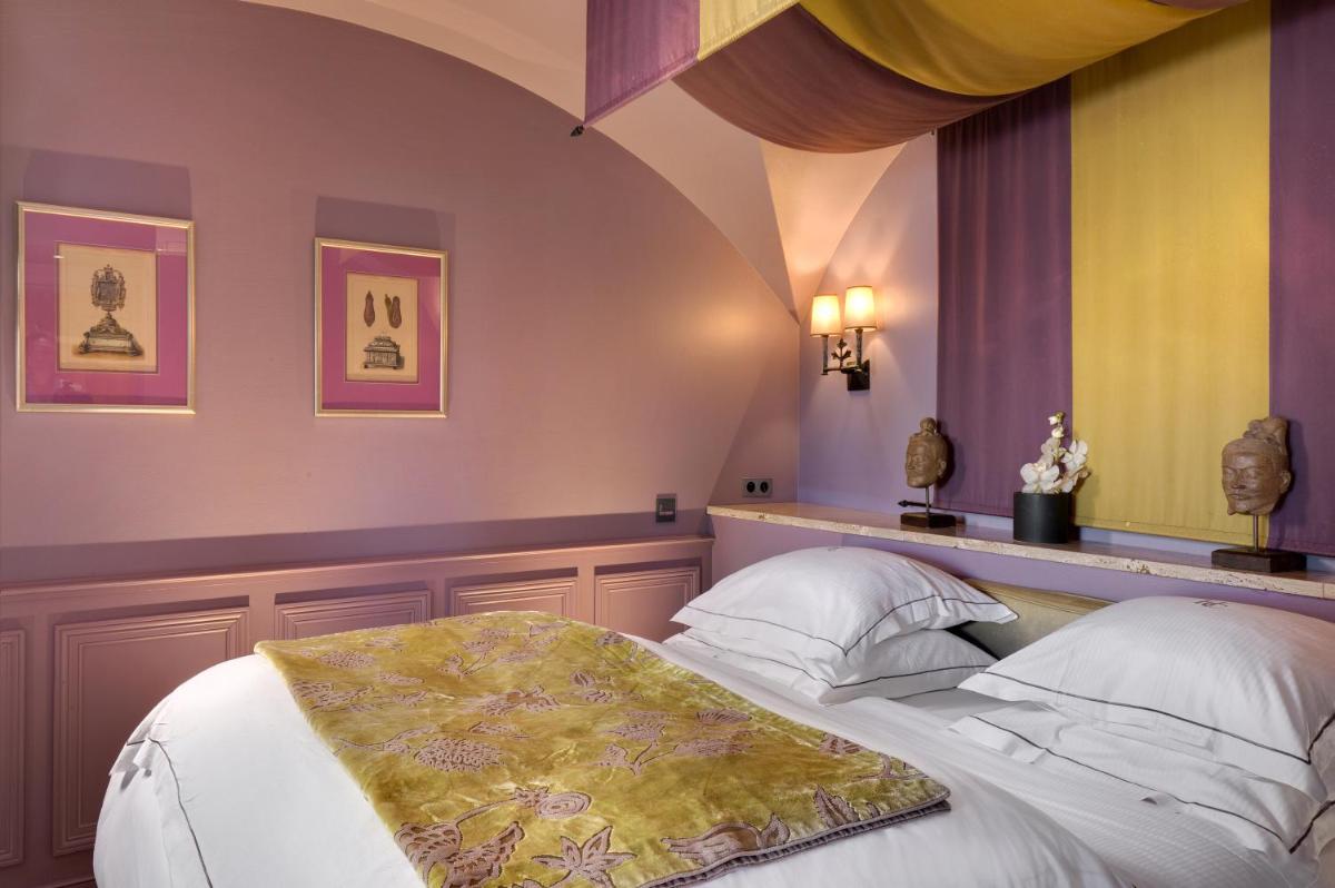 Un ou plusieurs lits dans un hébergement de l'établissement Hôtel du Château & Spa - Teritoria