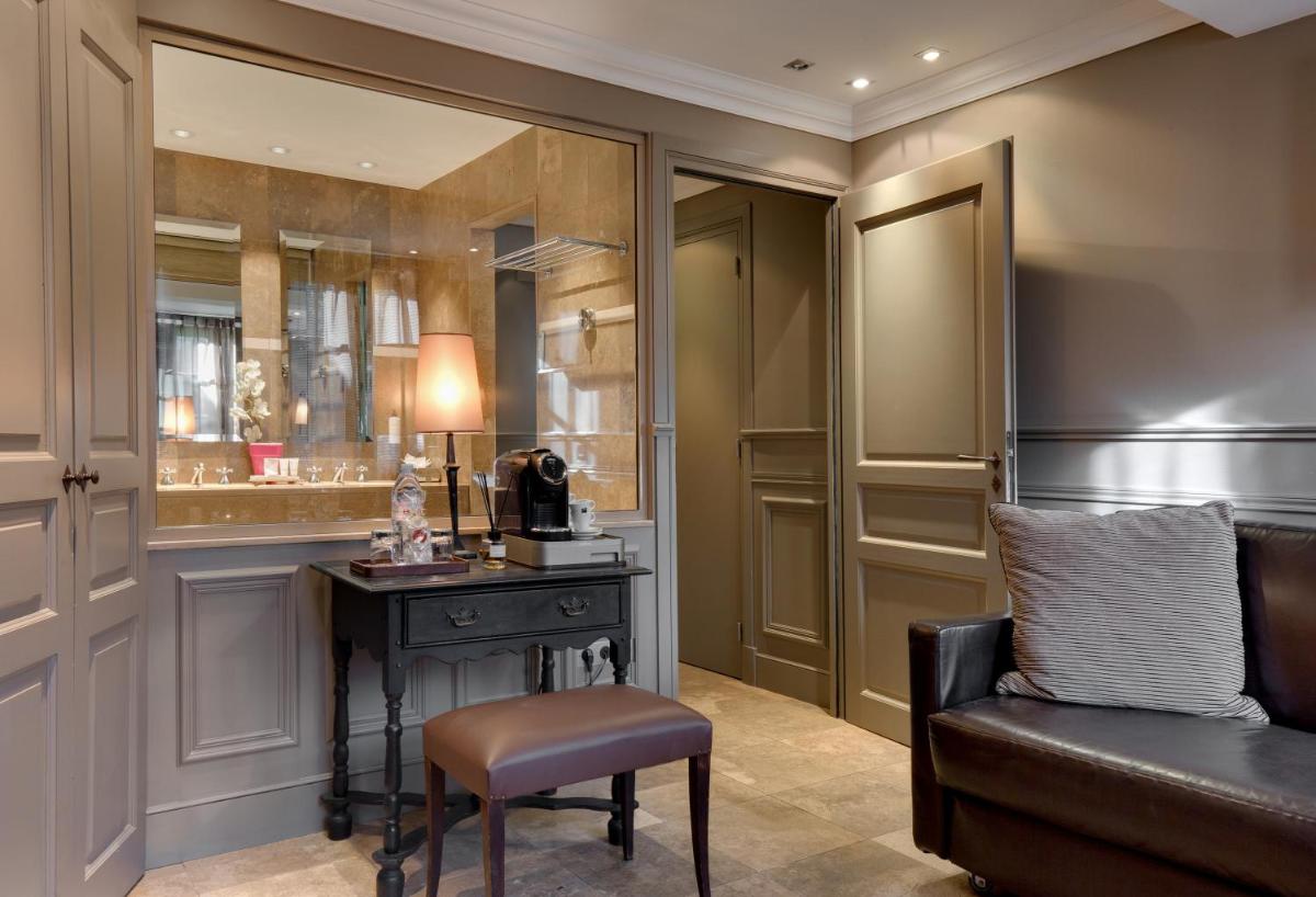 Coin salon dans l'établissement Hôtel du Château & Spa - Teritoria