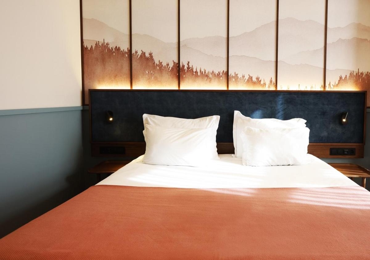 Uma cama ou camas num quarto em Montebelo Viseu Congress Hotel & Spa