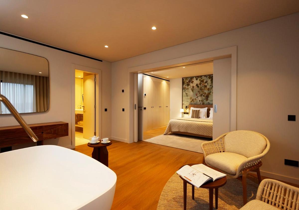 Uma cama ou camas num quarto em Montebelo Viseu Congress Hotel & Spa