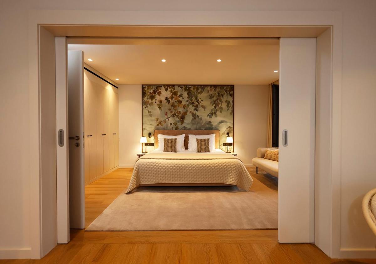 Uma cama ou camas num quarto em Montebelo Viseu Congress Hotel & Spa