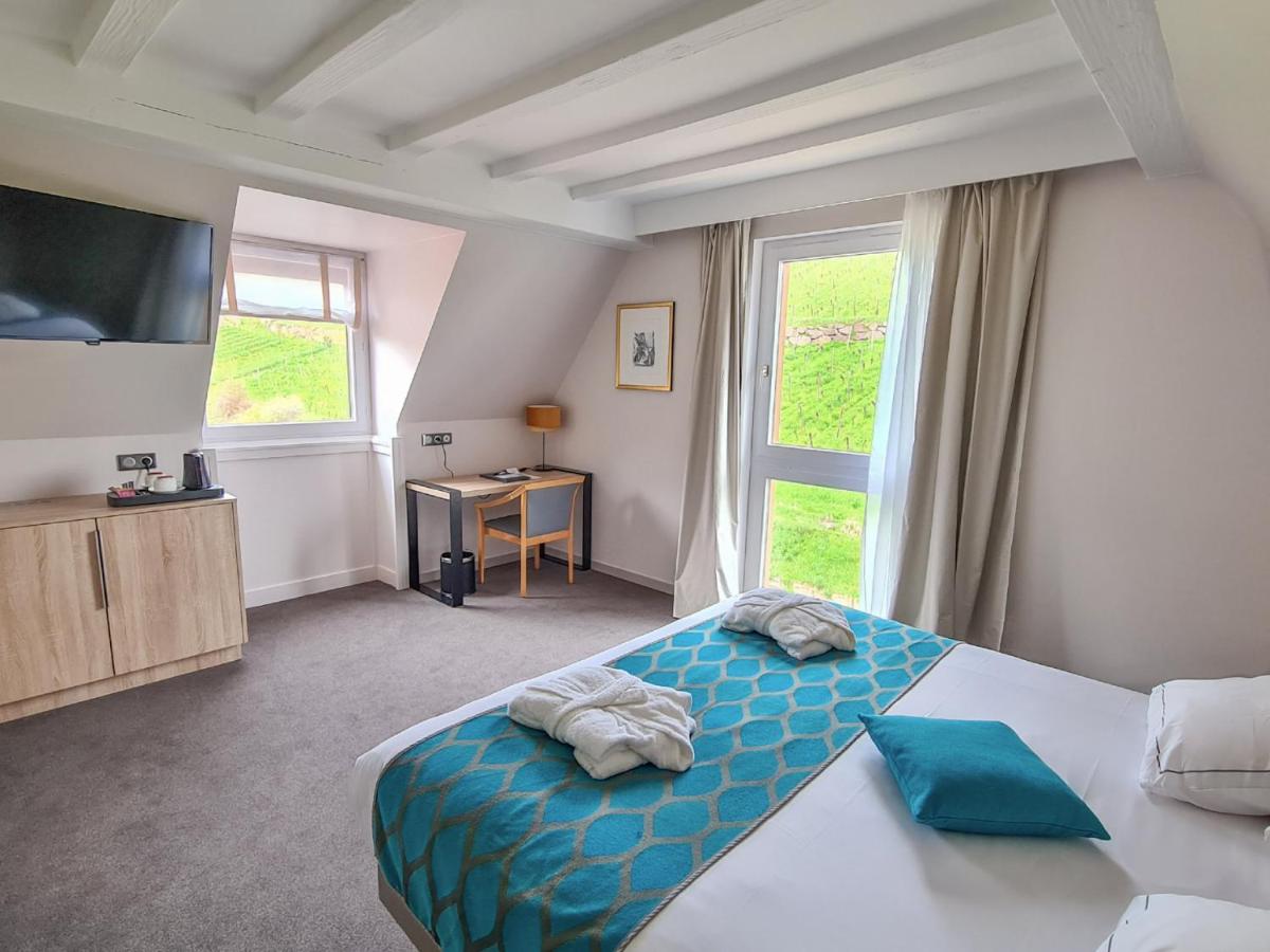 Un ou plusieurs lits dans un hébergement de l'établissement Best Western Plus Hotel & SPA Le Schoenenbourg