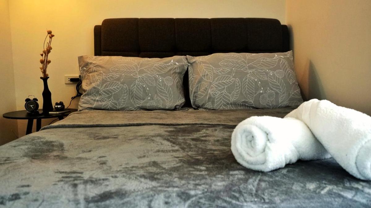 Modern Contemporary 1BR Fully Furnished Condo with Balcony at Prisma Residences - Hizvo