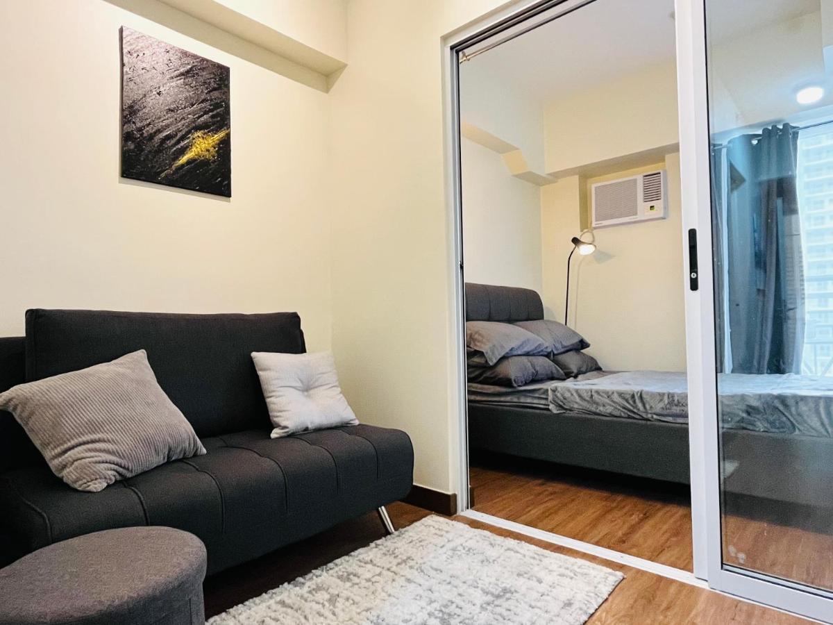 Modern Contemporary 1BR Fully Furnished Condo with Balcony at Prisma Residences - Hizvo