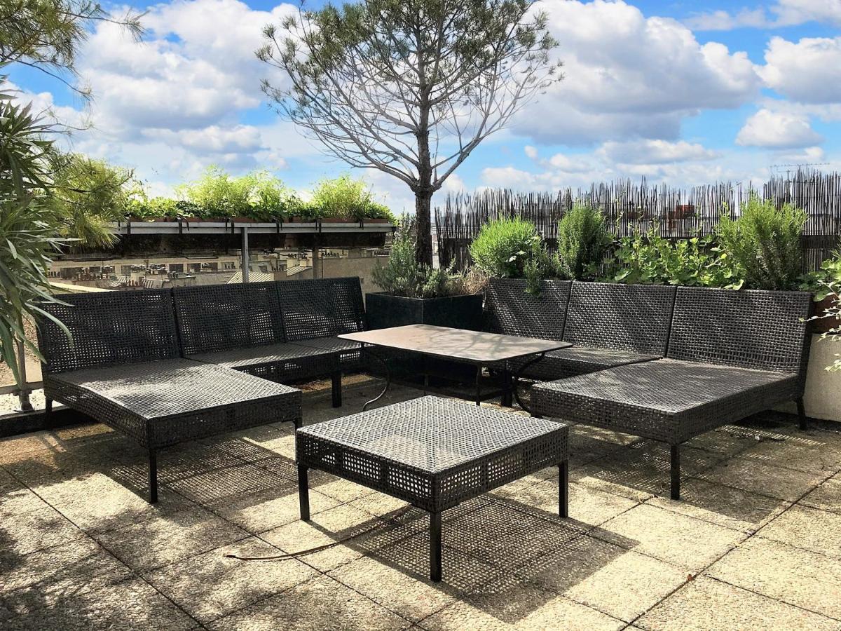 Appartement spacieux à Paris avec terrasse panoramique de 110 m² - Housity