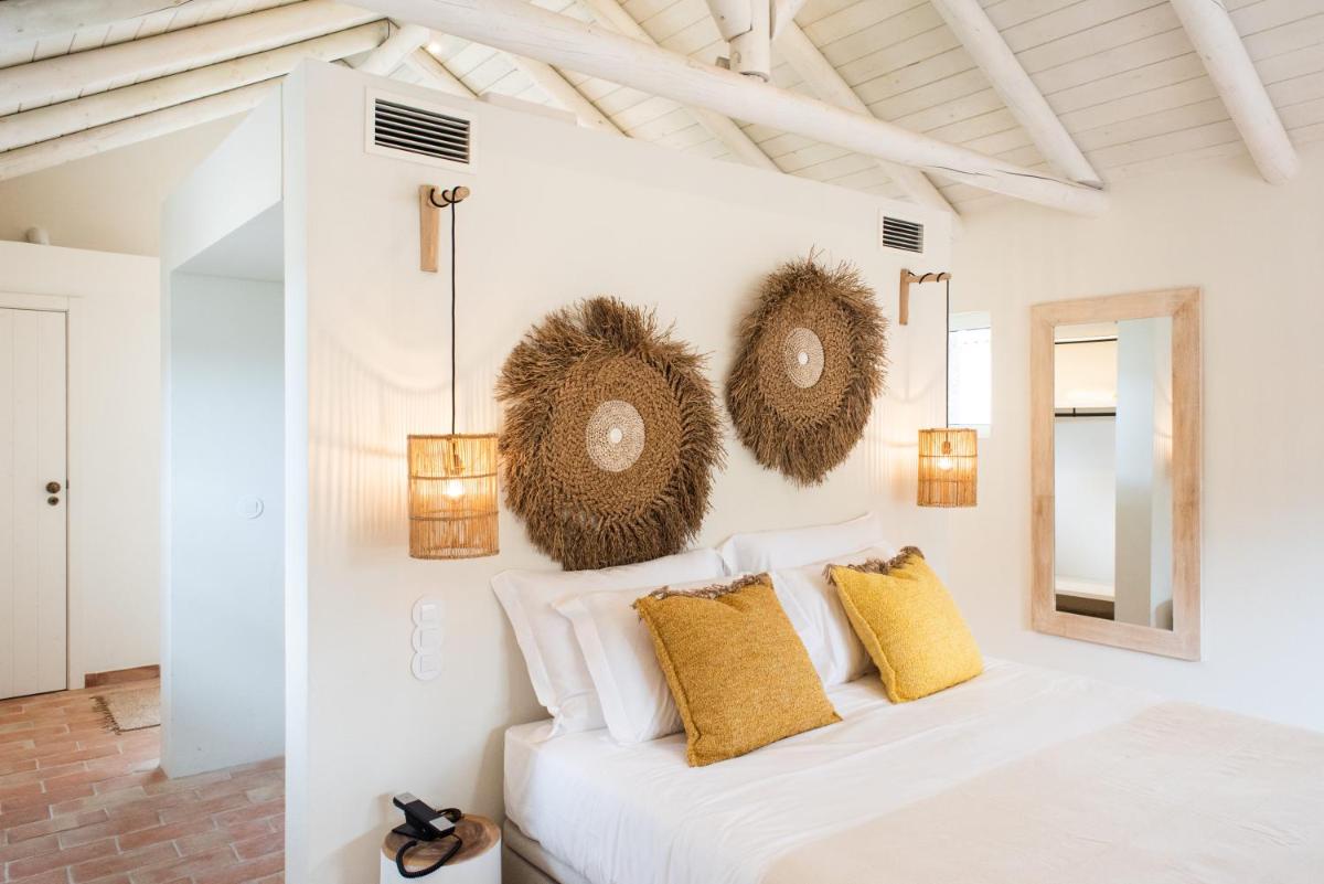 Uma cama ou camas num quarto em Independente Comporta