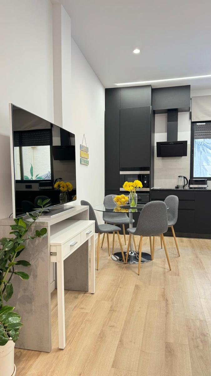 Una cocina o zona de cocina en Apart-hotel Happy Life