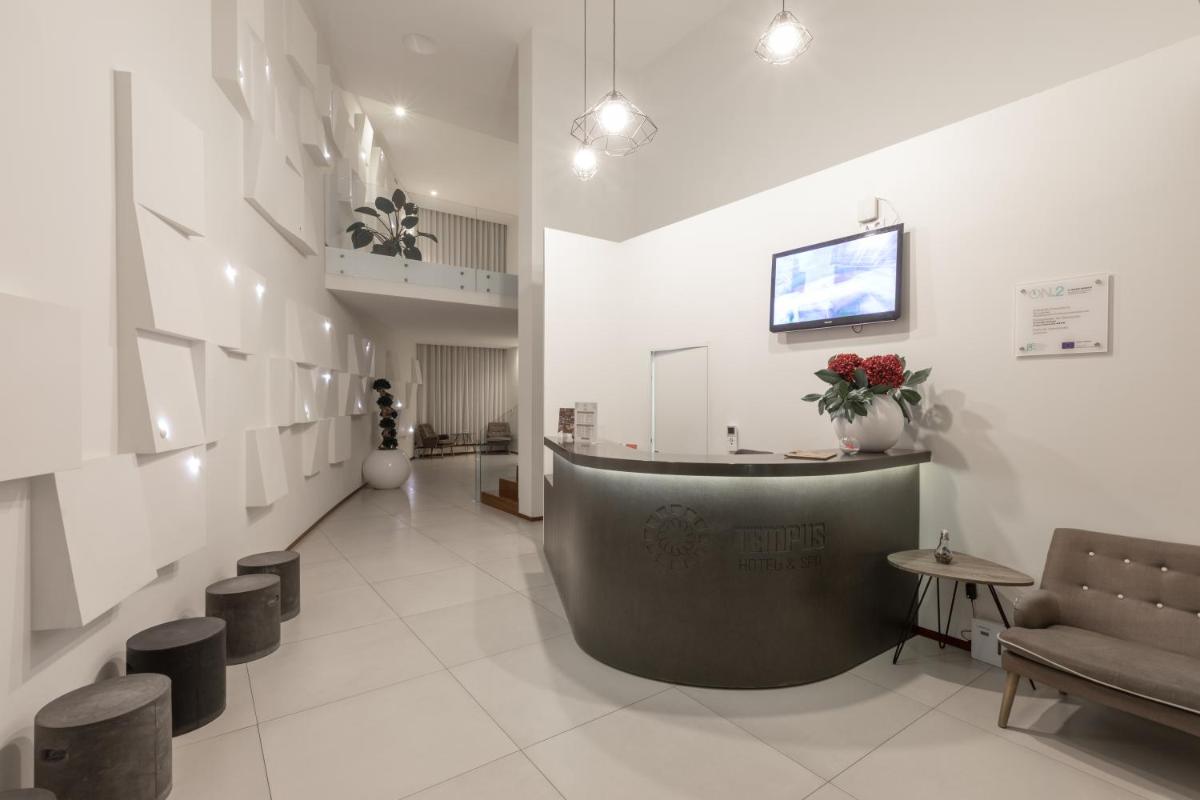 Uma área de estar em Tempus Hotel & Spa
