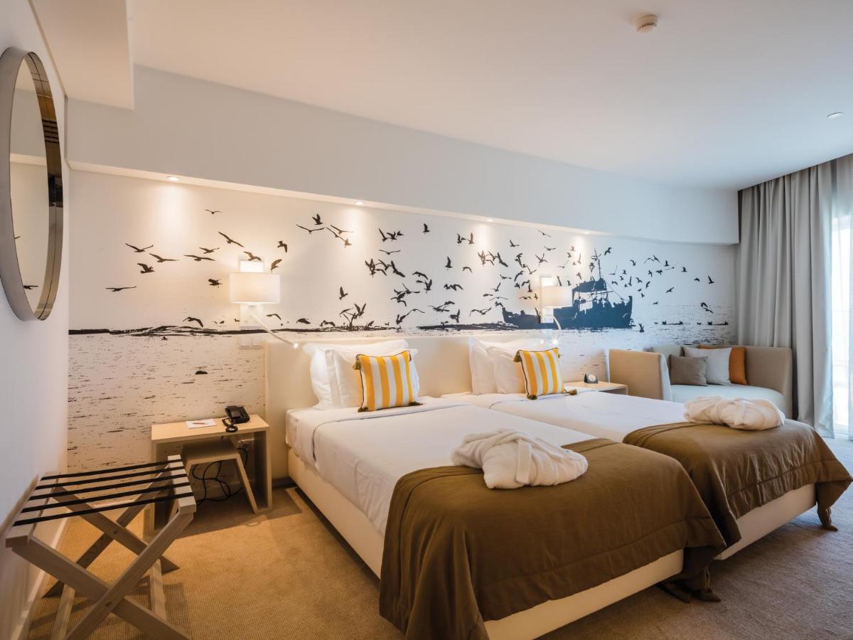 Uma cama ou camas num quarto em MH Peniche