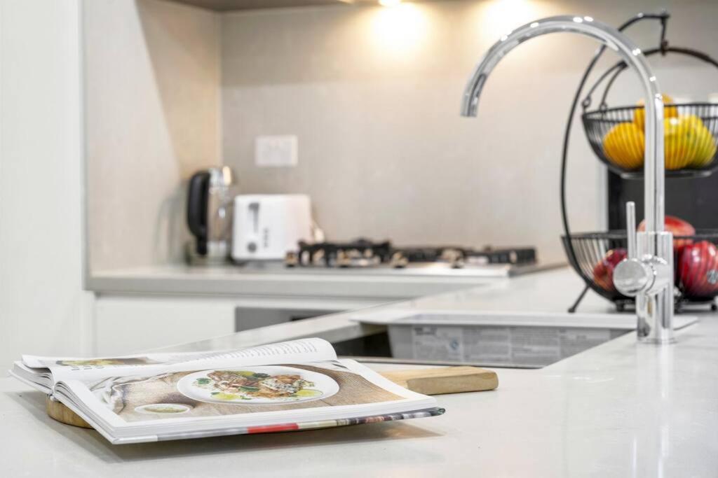 Stay Steps from Olympic Park : Spacious 3-Bedroom - Housity