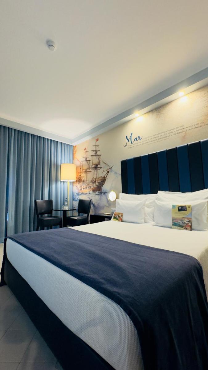 Uma cama ou camas num quarto em Vila Gale Nautico