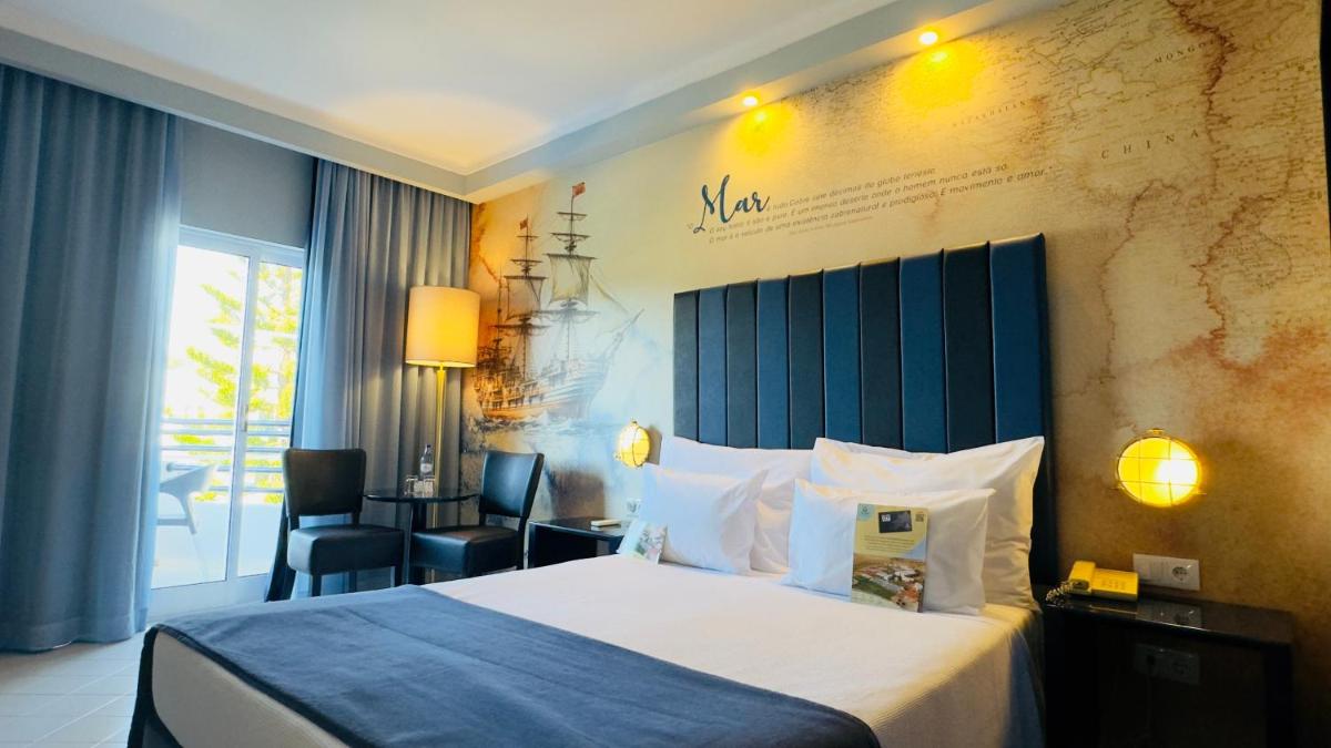 Uma cama ou camas num quarto em Vila Gale Nautico
