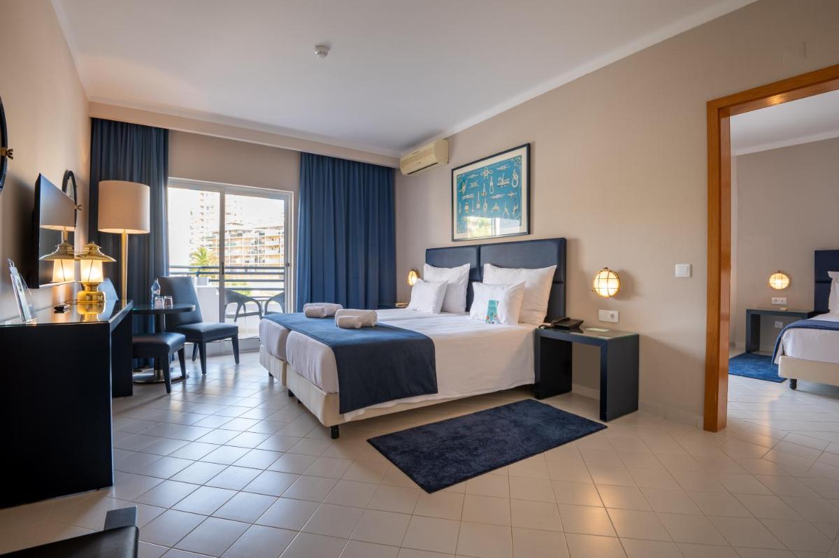 Uma cama ou camas num quarto em Vila Gale Nautico