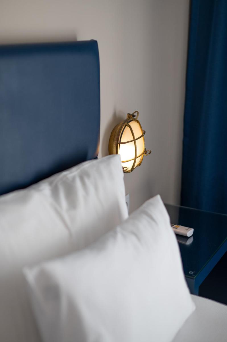 Uma cama ou camas num quarto em Vila Gale Nautico