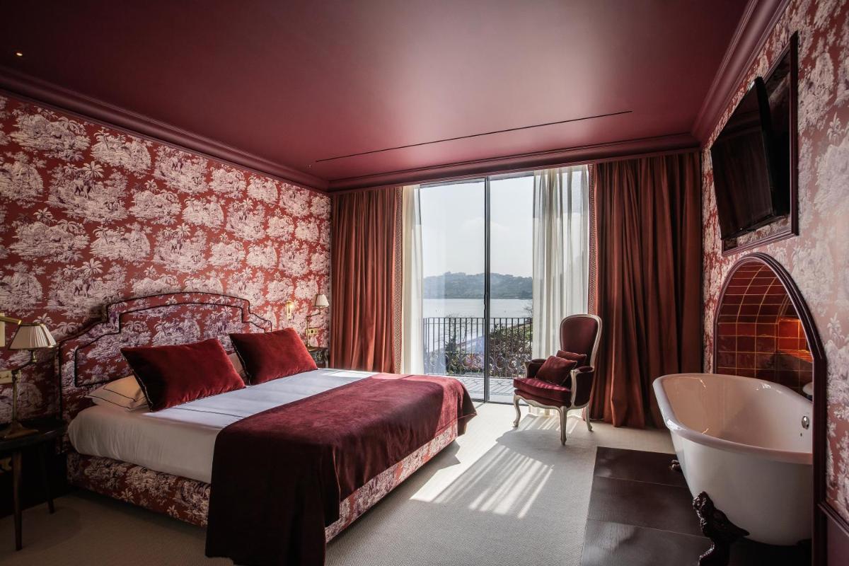 Uma cama ou camas num quarto em Vinha Boutique Hotel - The Leading Hotels of the World