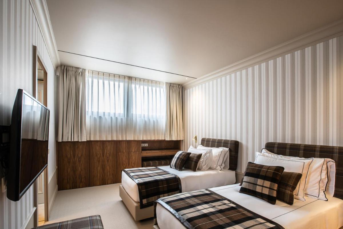 Uma cama ou camas num quarto em Vinha Boutique Hotel - The Leading Hotels of the World