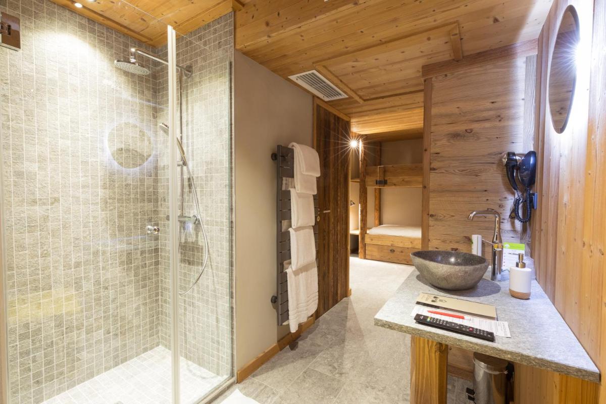Cuisine ou kitchenette dans l'établissement La Maison Rouge