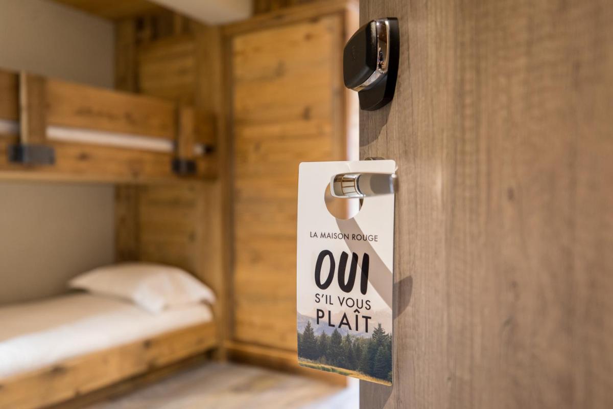 Un ou plusieurs lits dans un hébergement de l'établissement La Maison Rouge