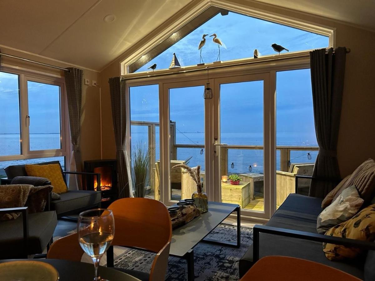 Traumlage Nr 59 5 Meter direkt am Wattenmeer erste Reihe Luxus Chalet unendliche Weite, eingebettet in der Natur - Housity
