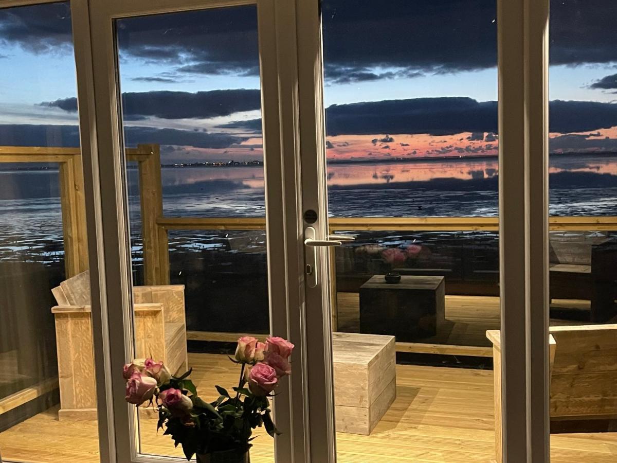 Traumlage Nr 59 5 Meter direkt am Wattenmeer erste Reihe Luxus Chalet unendliche Weite, eingebettet in der Natur - Housity