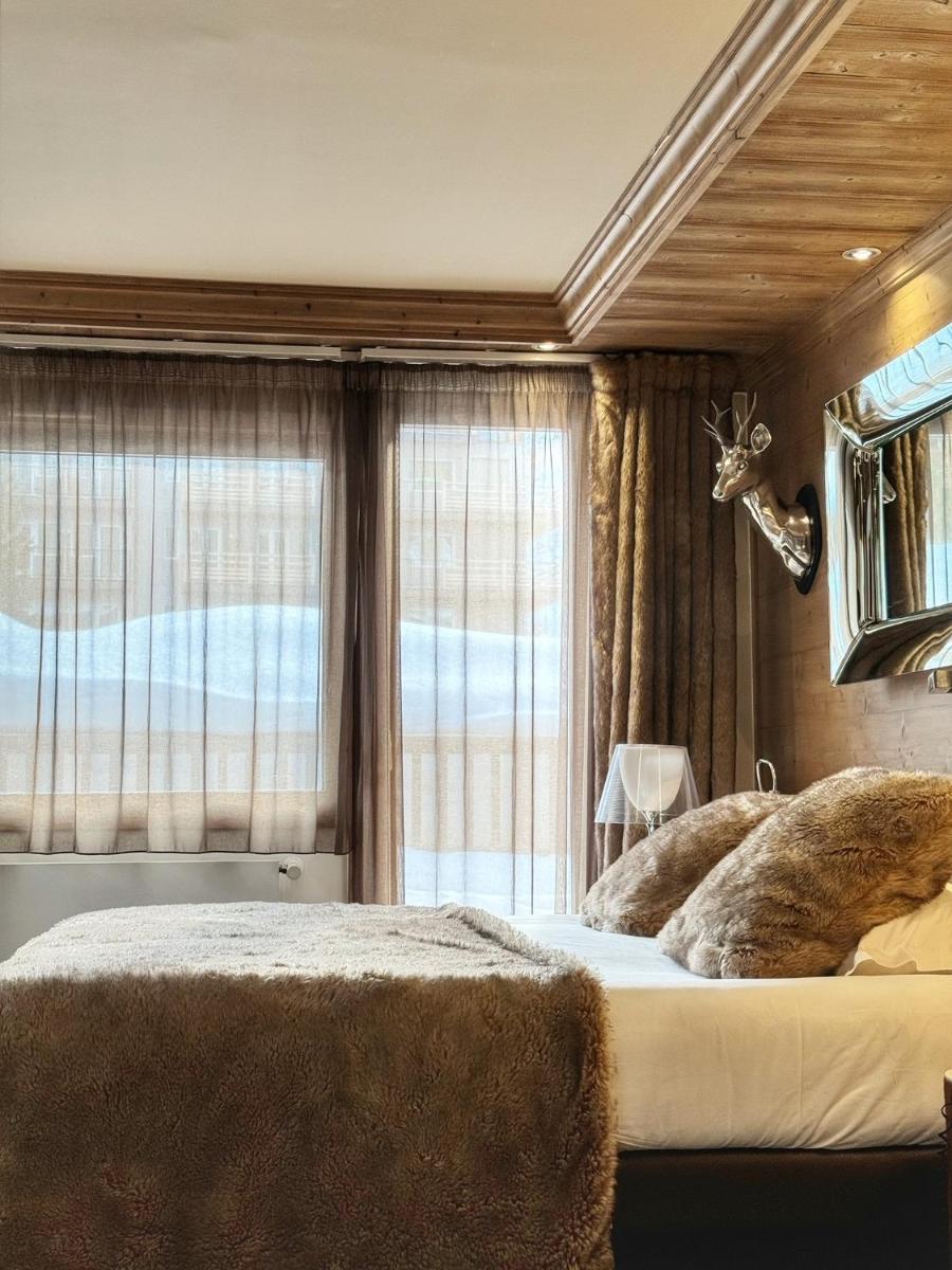 Un ou plusieurs lits dans un hébergement de l'établissement Hotel Tsanteleina