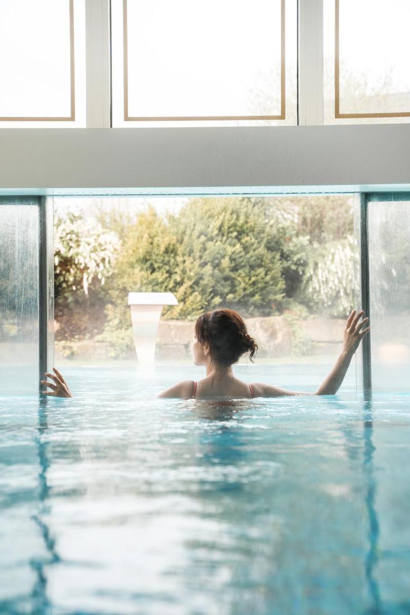 Der Swimmingpool an oder in der Nähe von Wellness & Genuss Resort - Engel Obertal
