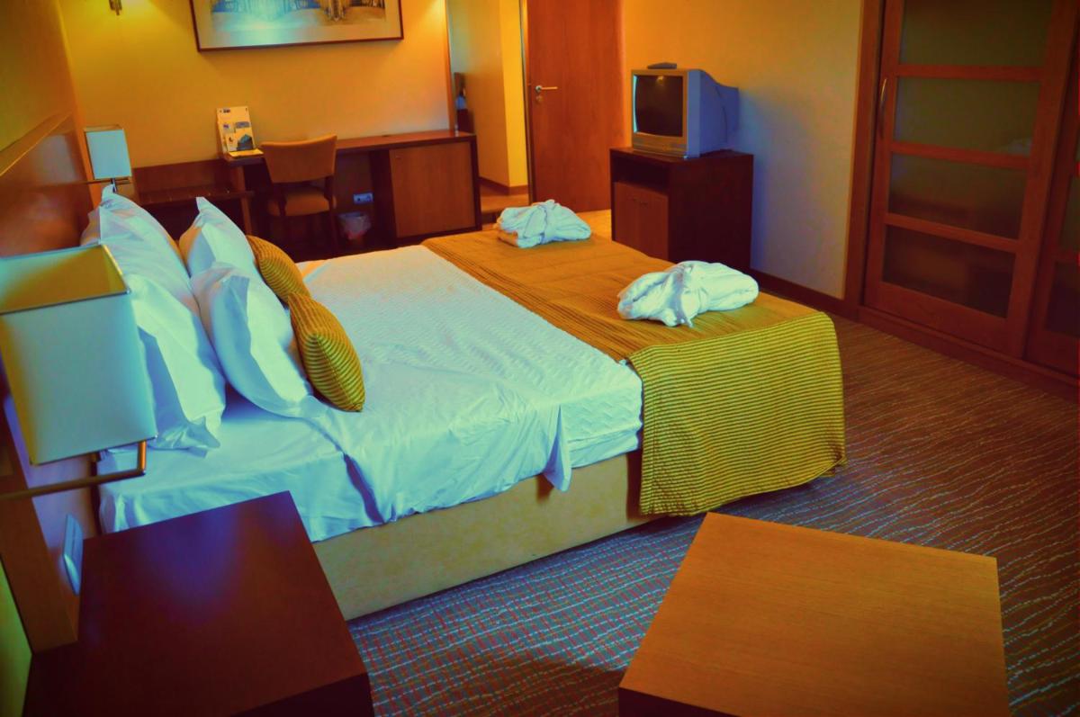 Uma cama ou camas num quarto em Hotel Lusitania Congress & Spa