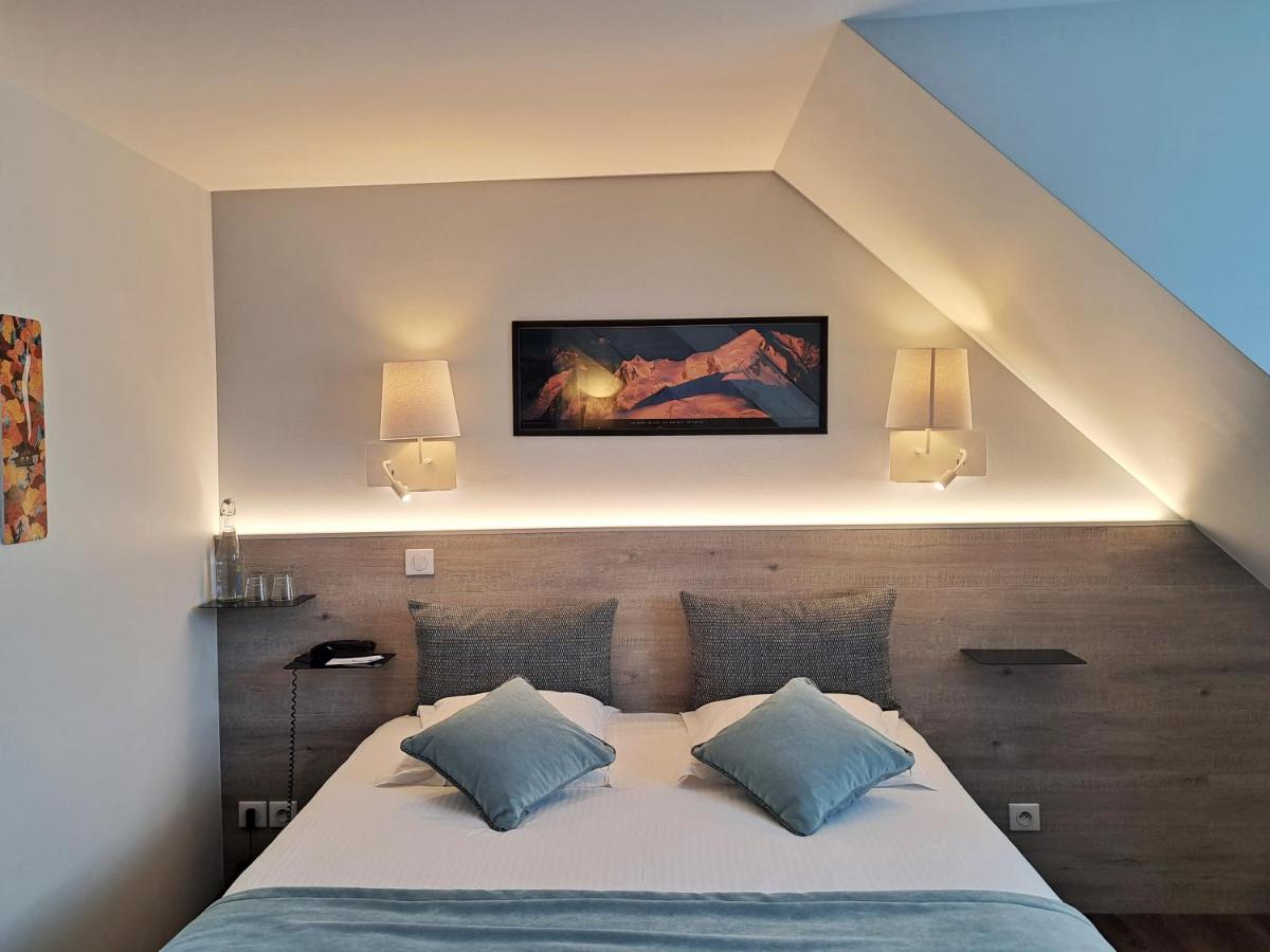 Un ou plusieurs lits dans un hébergement de l'établissement Hôtel des Princes, Chambéry Centre