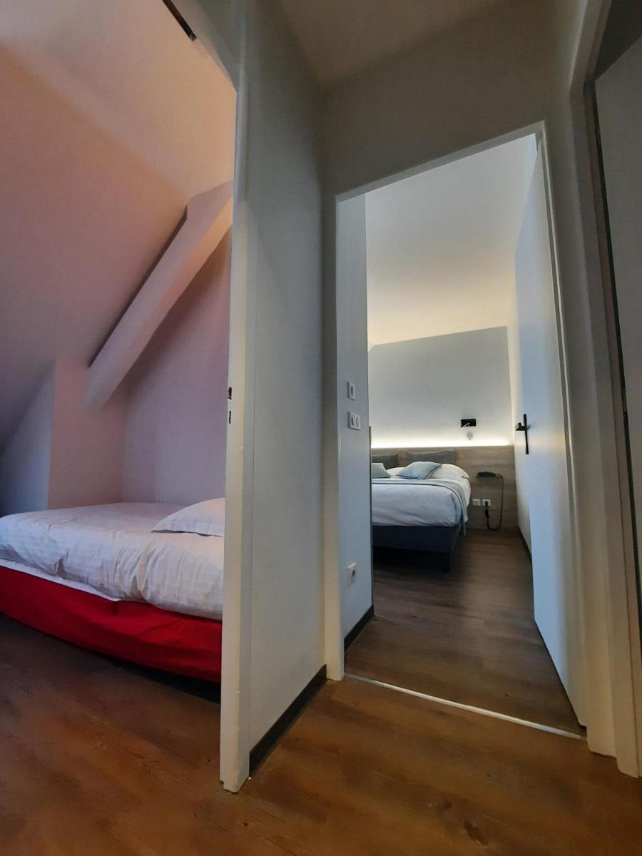 Un ou plusieurs lits dans un hébergement de l'établissement Hôtel des Princes, Chambéry Centre